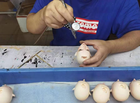 LORIBEAR figure head being hand-finished